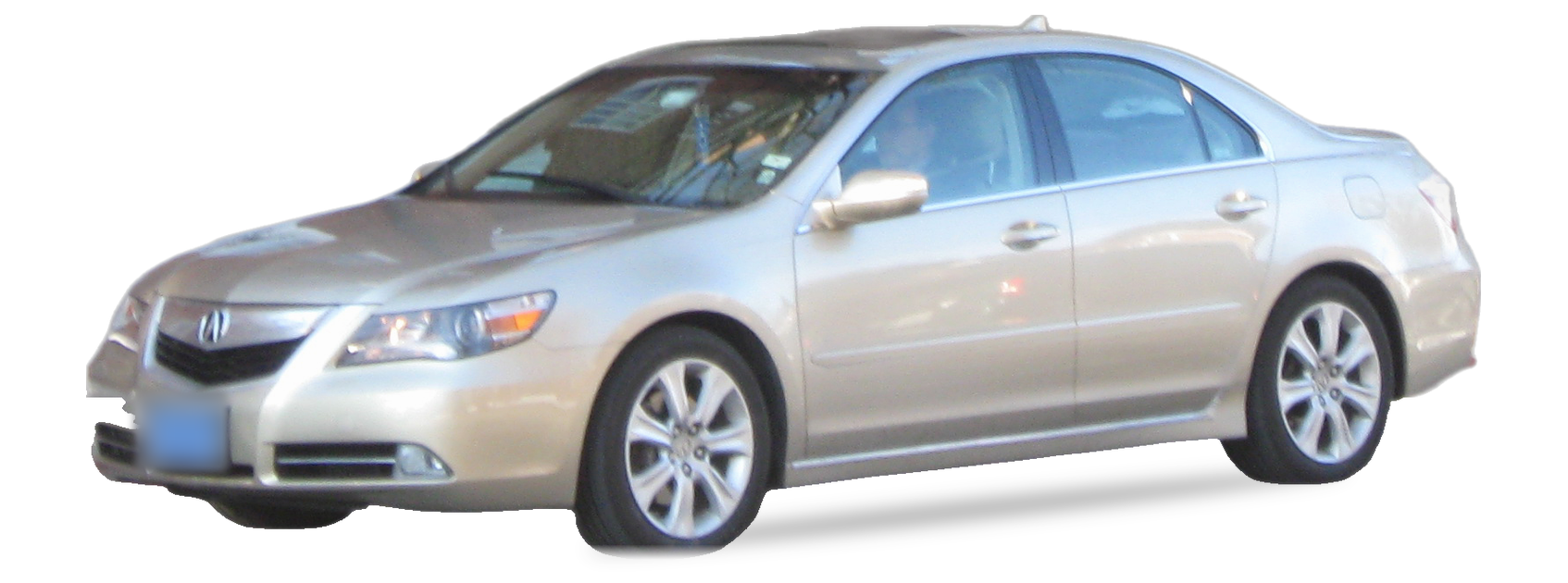 Acura RL champán (segunda generación), sedán, vista frontal de tres cuartos, con las ubicaciones del VIN marcadas