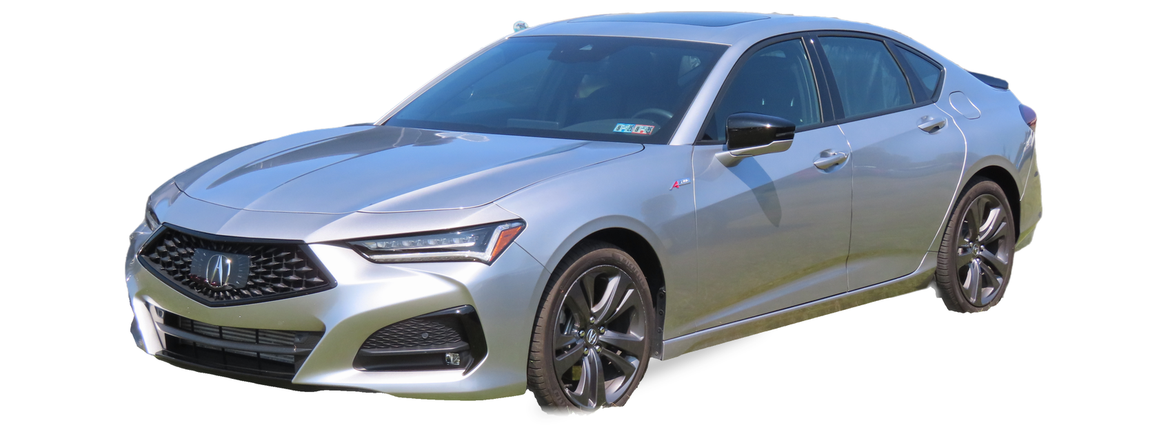 Silver Acura TLX (second generation) sedan, front three-quarter view, with the VIN locations marked