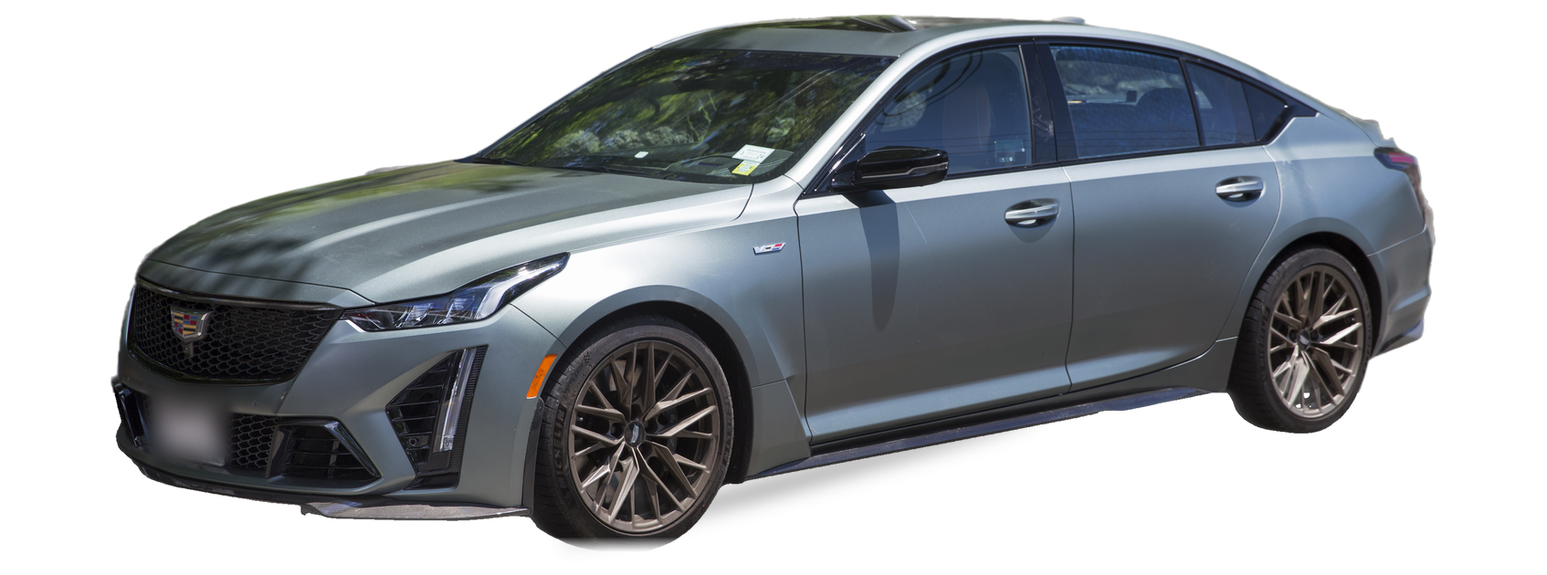 Grey-green Cadillac CT5 (first generation) sedan, front three-quarter view, with the VIN locations marked