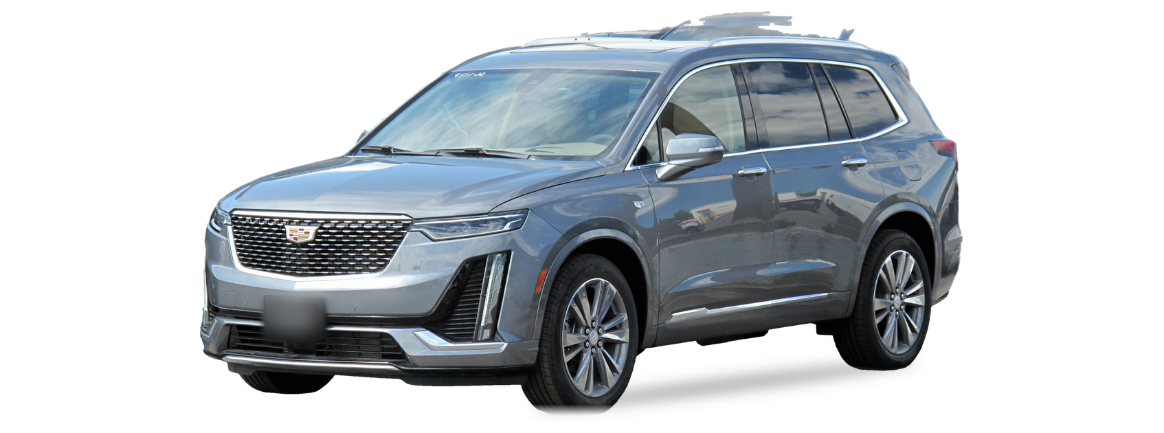 Cadillac XT6 gris (primera generación), SUV, vista frontal de tres cuartos, con las ubicaciones del VIN marcadas