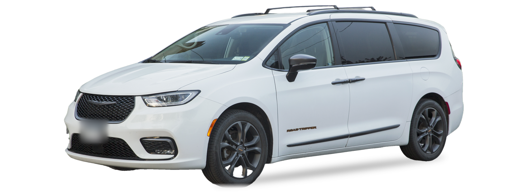 White Chrysler Pacifica (second generation) minivan, front three-quarter view, with the VIN locations marked