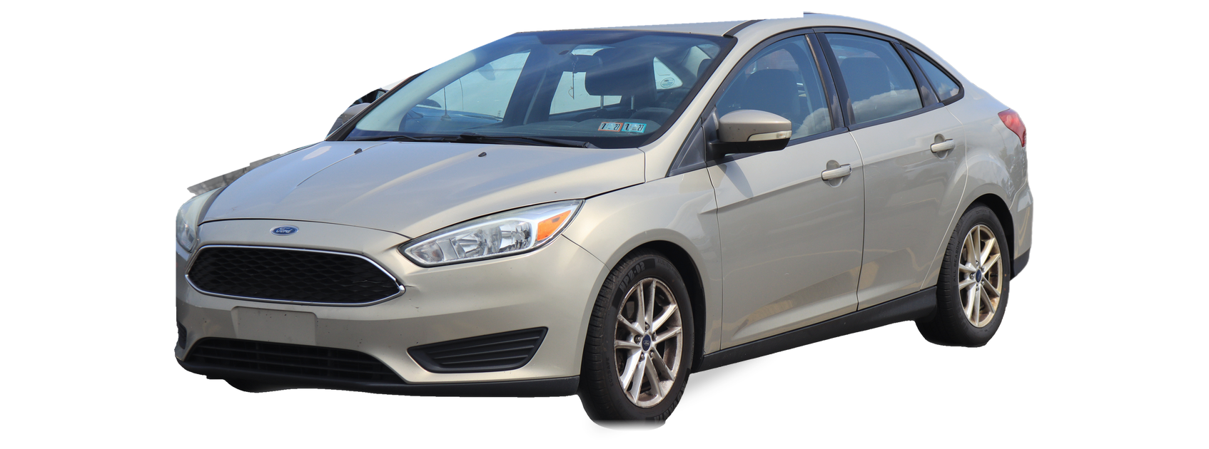 Ford Focus plateado (tercera generación), sedán, vista frontal de tres cuartos, con las ubicaciones del VIN marcadas