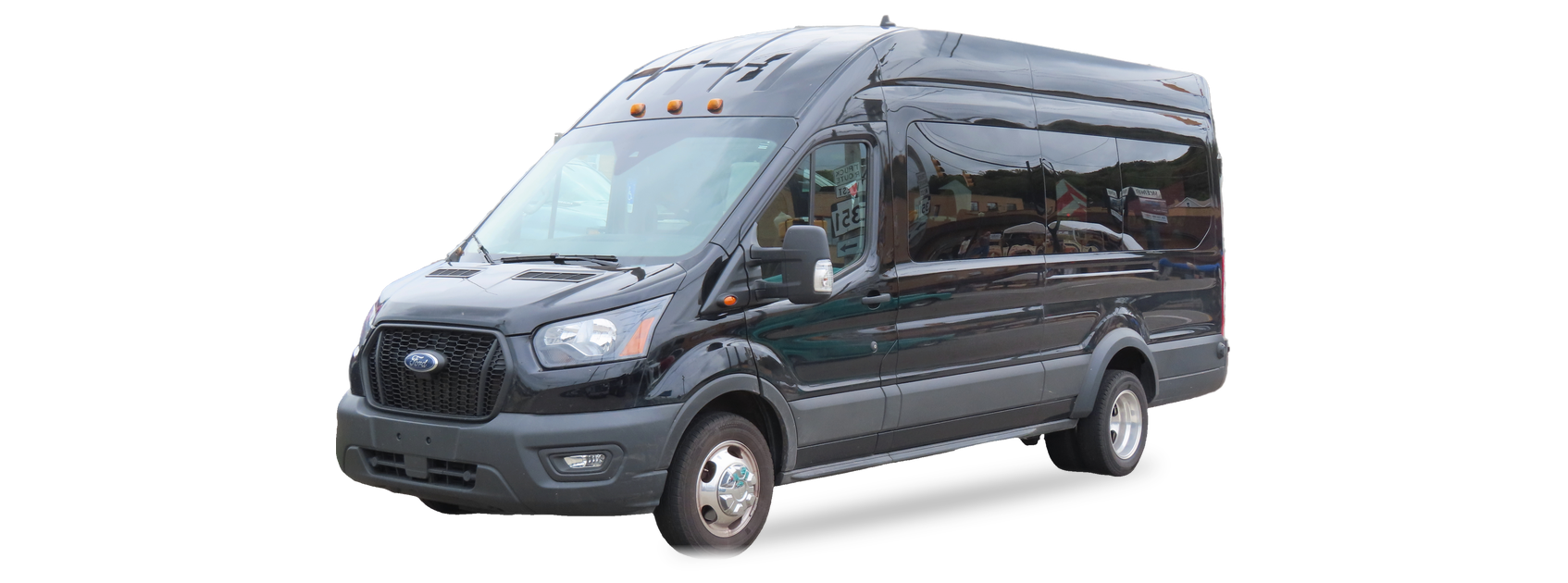 Dark grey Ford Transit (2015+ generation) van, front three-quarter view, with the VIN locations marked