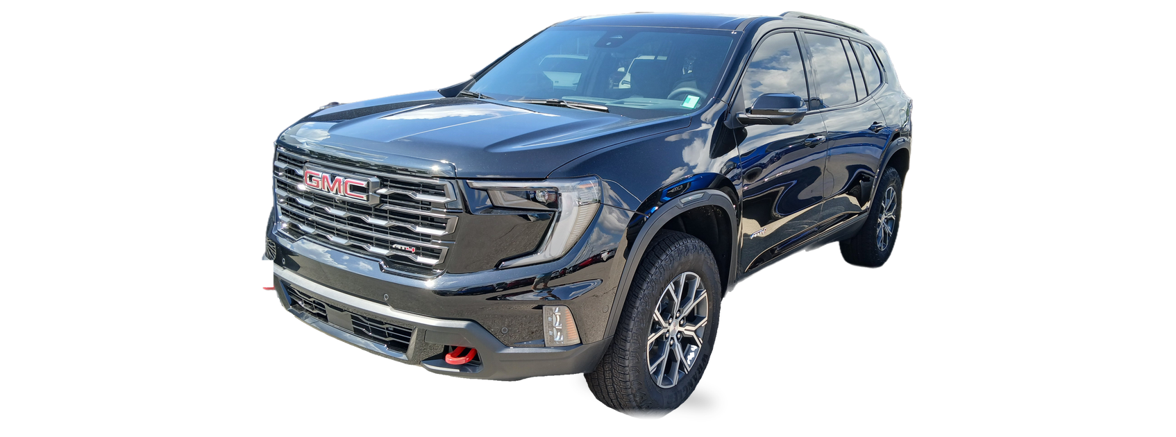 Dark blue GMC Acadia (third generation) SUV, front three-quarter view, with the VIN locations marked