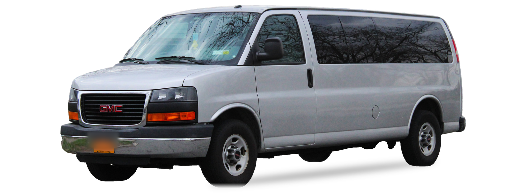GMC Savana plateado (segunda generación), furgoneta, vista frontal de tres cuartos, con las ubicaciones del VIN marcadas