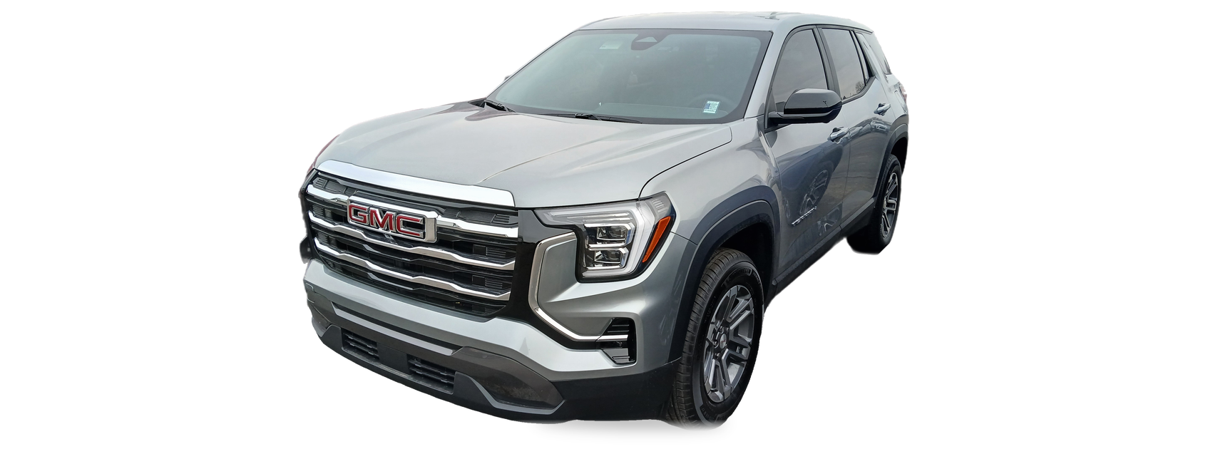 Silver GMC Terrain (third generation) crossover, front three-quarter view, with the VIN locations marked