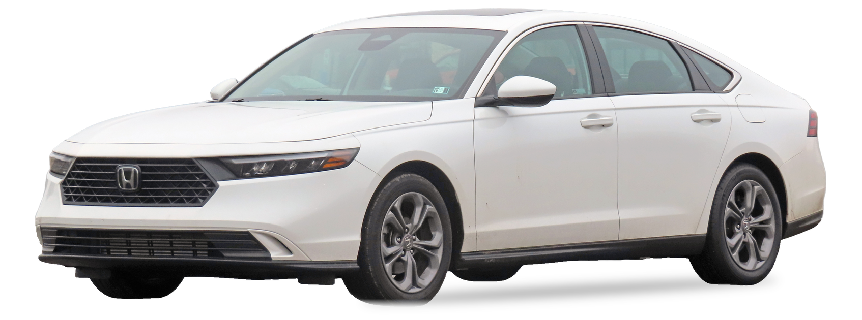White Honda Accord (11th generation) sedan, front three-quarter view, with the VIN locations marked