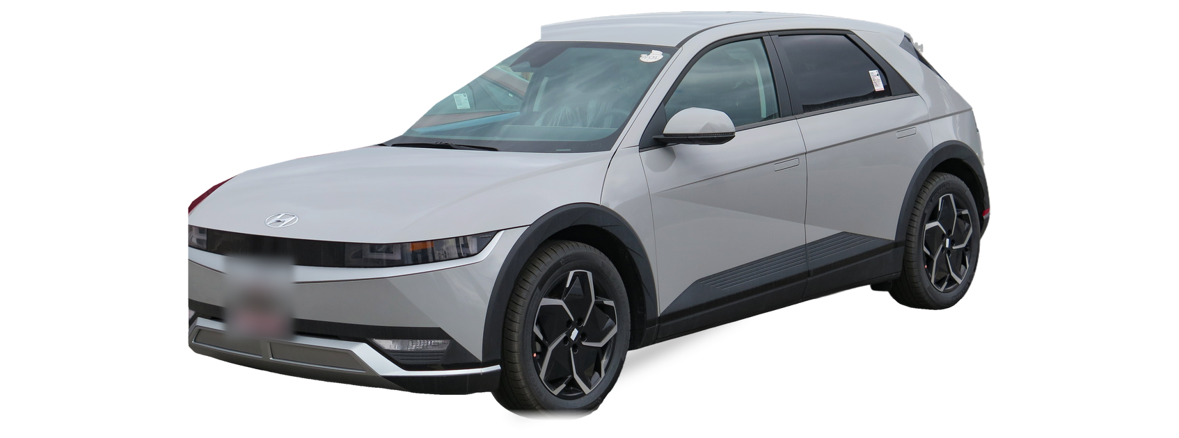 Grey Hyundai Ioniq 5 (first generation) crossover, front three-quarter view, with the VIN locations marked