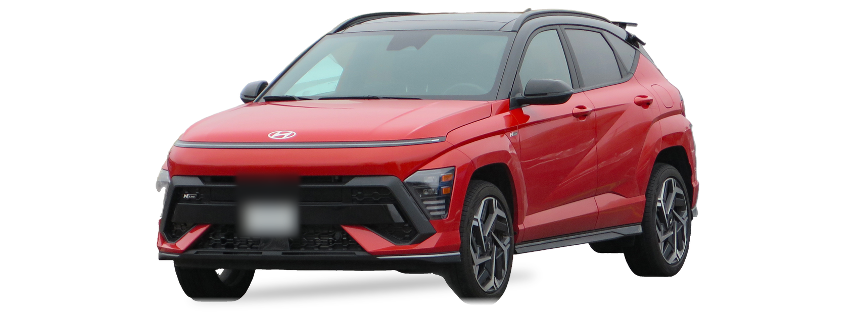 Orange Hyundai Kona (second generation) crossover, front three-quarter view, with the VIN locations marked