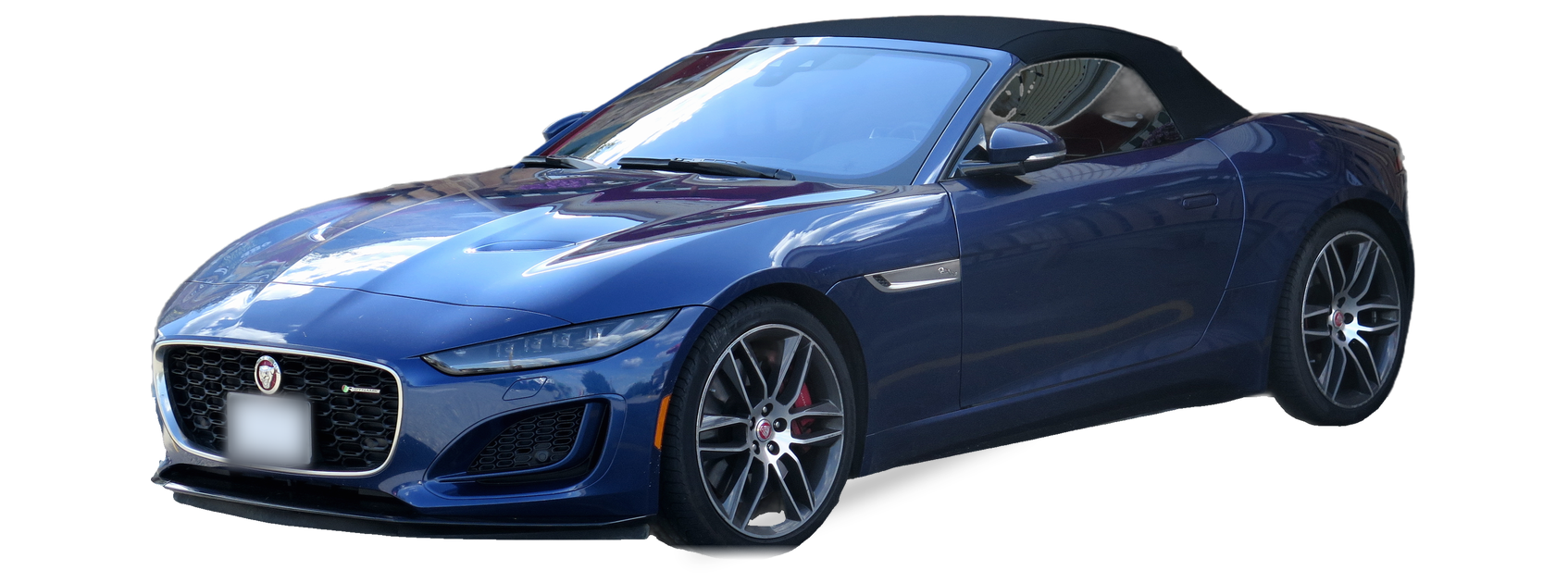 Blue Jaguar F-Type (first generation) convertible, front three-quarter view, with the VIN locations marked