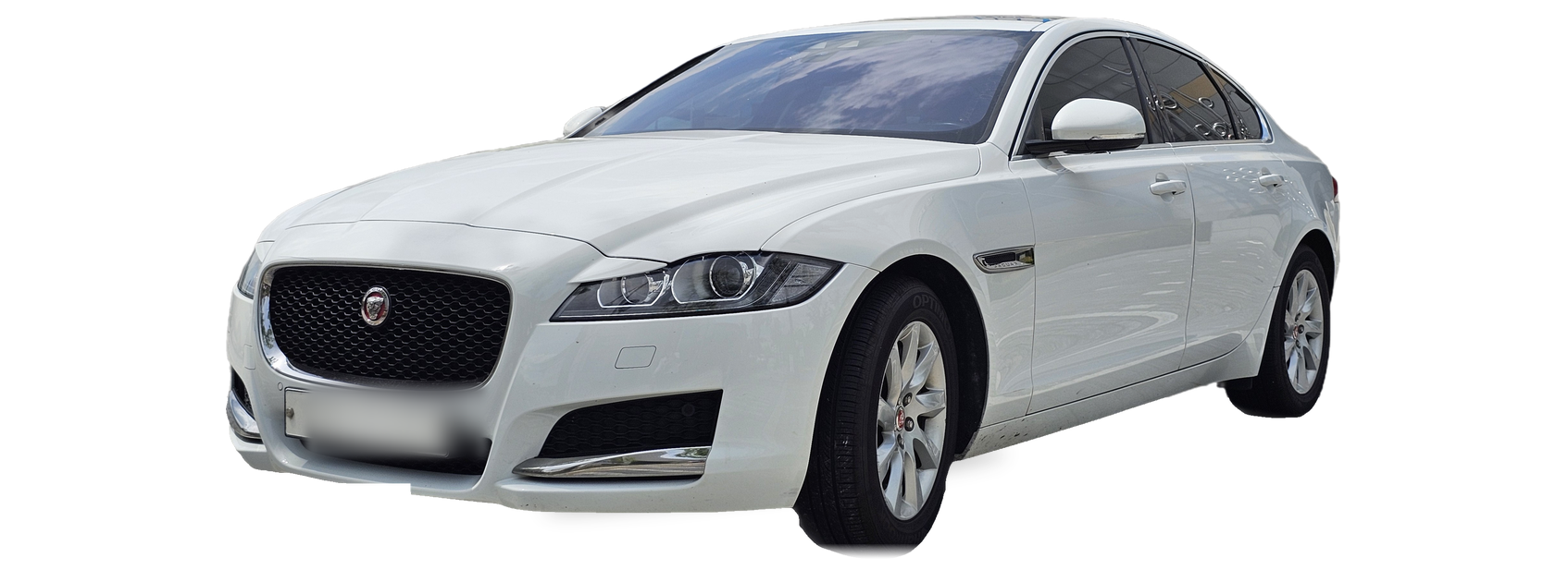Jaguar XF blanco (segunda generación), sedán, vista frontal de tres cuartos, con las ubicaciones del VIN marcadas