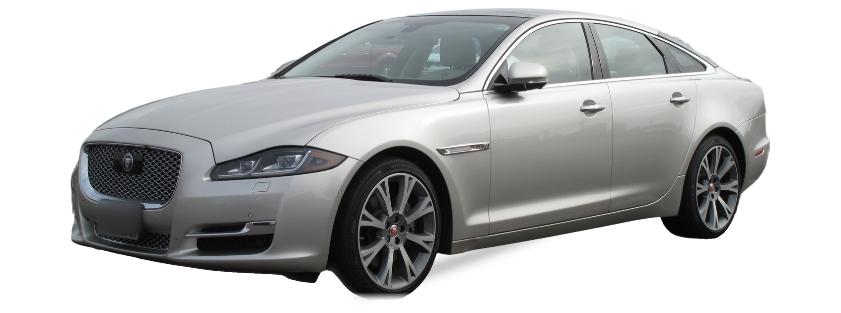 Jaguar XJ plateado (última generación), sedán, vista frontal de tres cuartos, con las ubicaciones del VIN marcadas