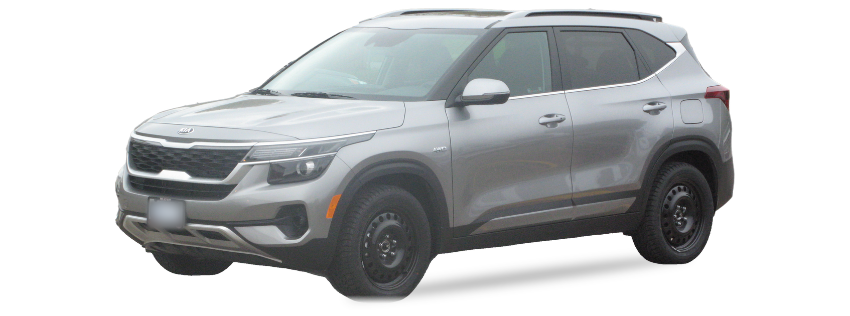 Silver Kia Seltos (first generation) SUV, front three-quarter view, with the VIN locations marked