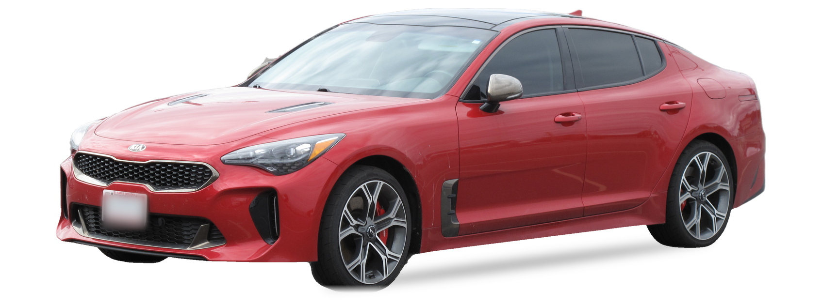 Red Kia Stinger (first generation) fastback sedan, front three-quarter view, with the VIN locations marked