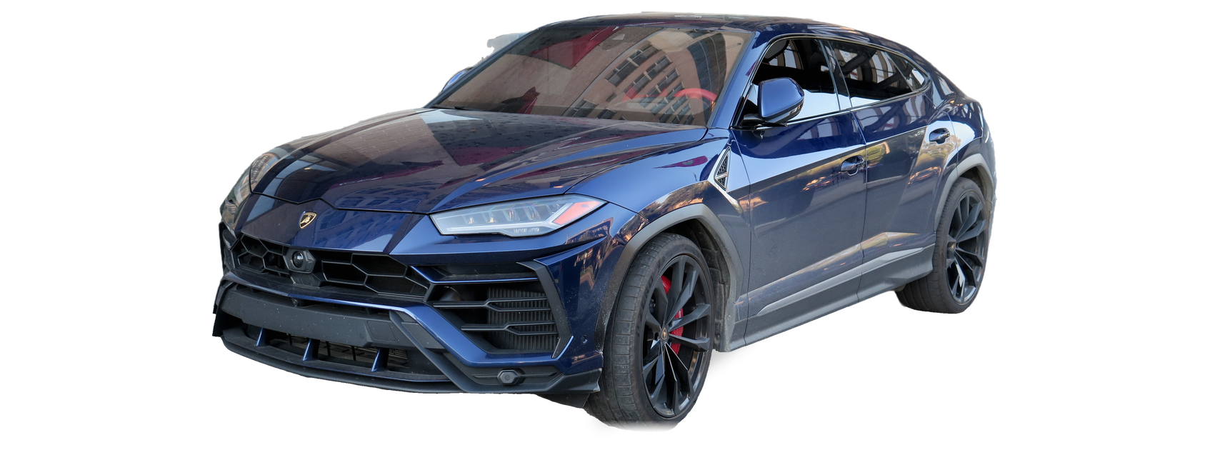 Dark blue Lamborghini Urus (first generation) SUV, front three-quarter view, with the VIN locations marked