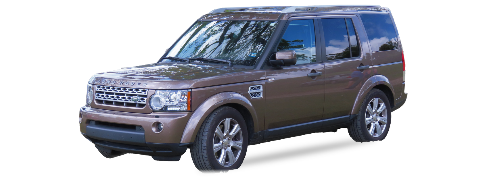 Brown Land Rover LR4 (LR4 generation) SUV, front three-quarter view, with the VIN locations marked
