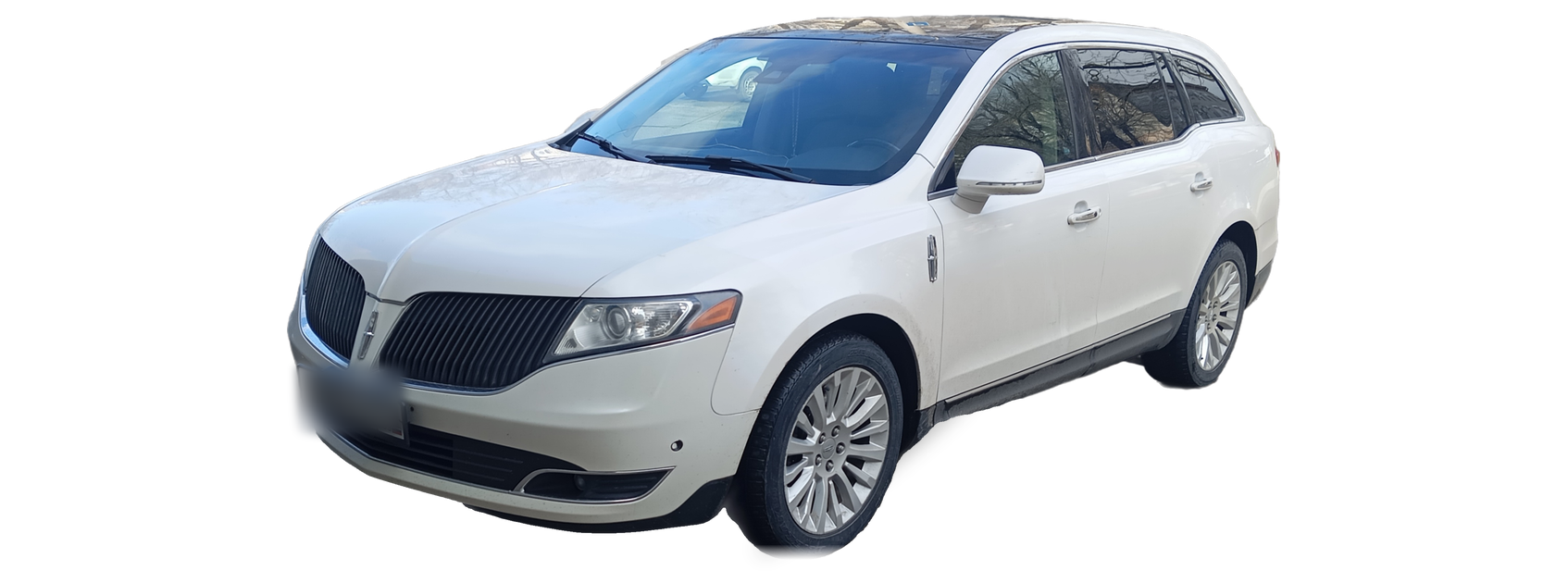 White Lincoln MKT (first generation) crossover, front three-quarter view, with the VIN locations marked