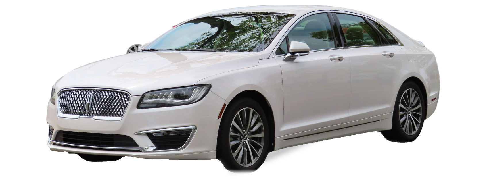 White Lincoln MKZ (second generation) sedan, front three-quarter view, with the VIN locations marked