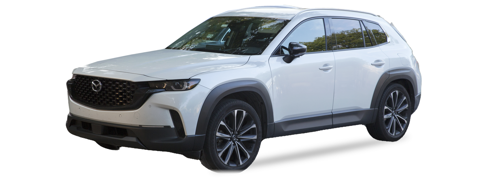 White Mazda CX-50 (first generation) SUV, front three-quarter view, with the VIN locations marked