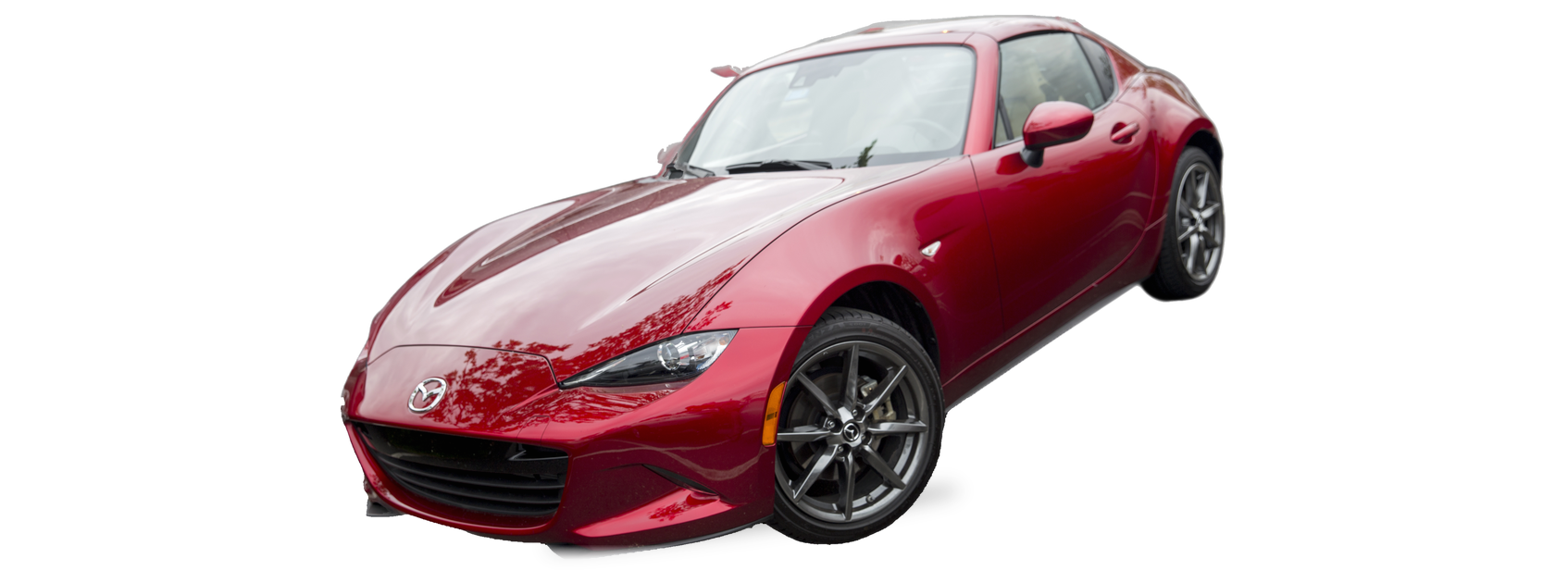 Mazda MX-5 Miata rojo (cuarta generación), roadster de techo duro retráctil, vista frontal de tres cuartos, con las ubicaciones del VIN marcadas