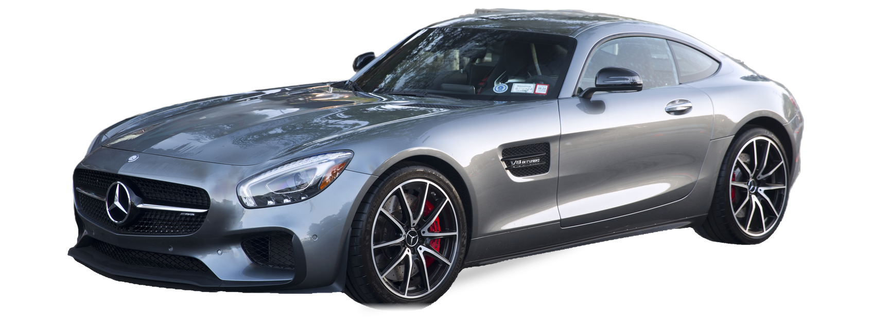 Mercedes-Benz AMG GT gris (primera generación), cupé, vista frontal de tres cuartos, con las ubicaciones del VIN marcadas