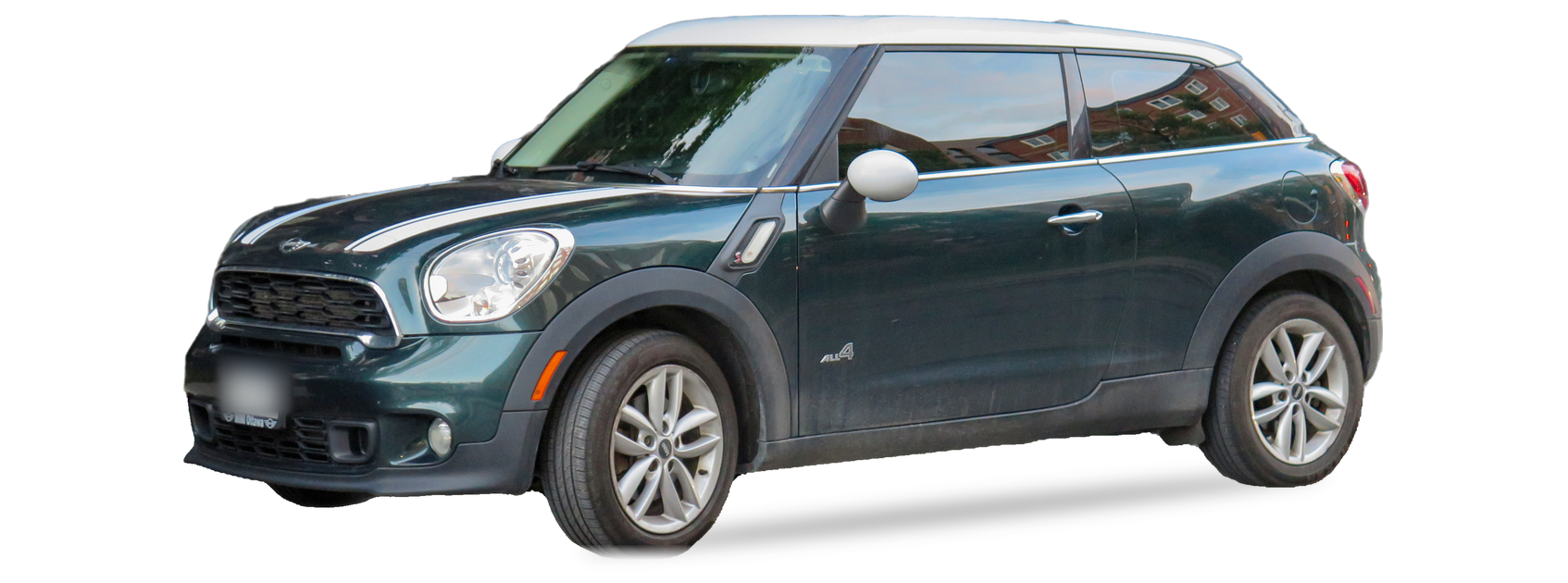 Green MINI Paceman (first generation) crossover coupe, front three-quarter view, with the VIN locations marked