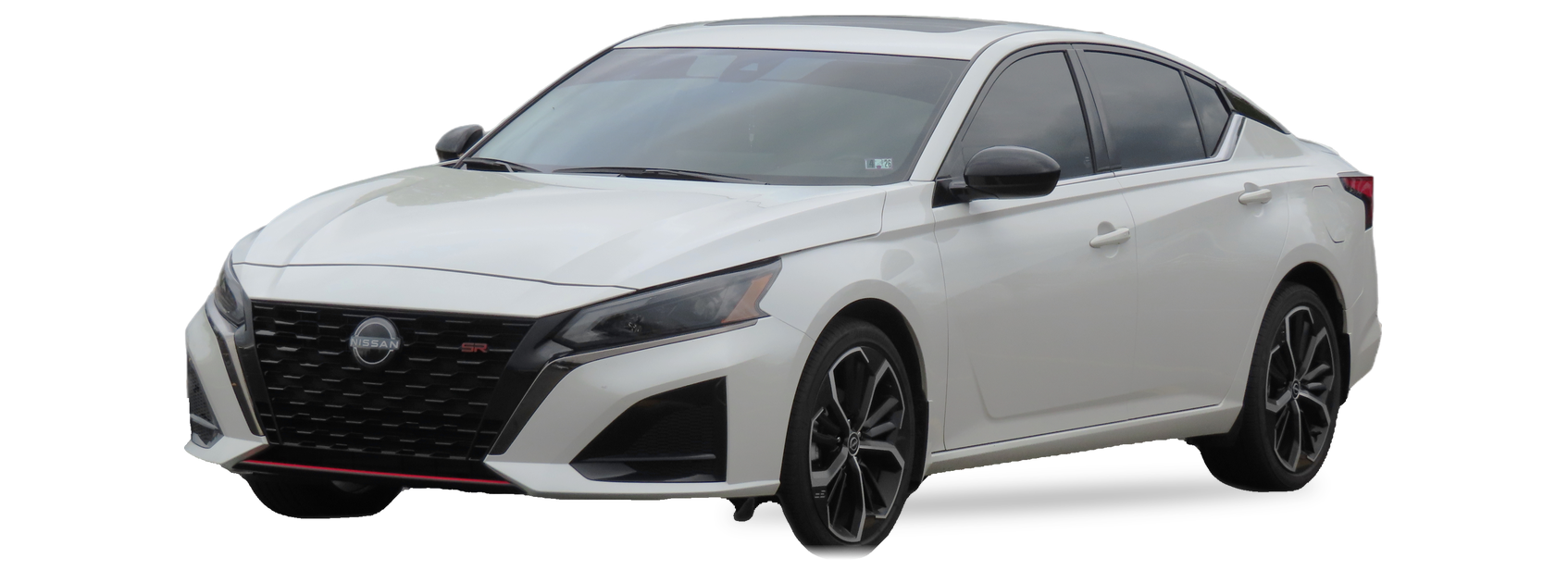 White Nissan Altima (sixth generation) sedan, front three-quarter view, with the VIN locations marked