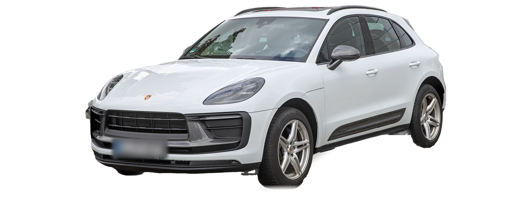 White Porsche Macan (first generation) SUV, front three-quarter view, with the VIN locations marked