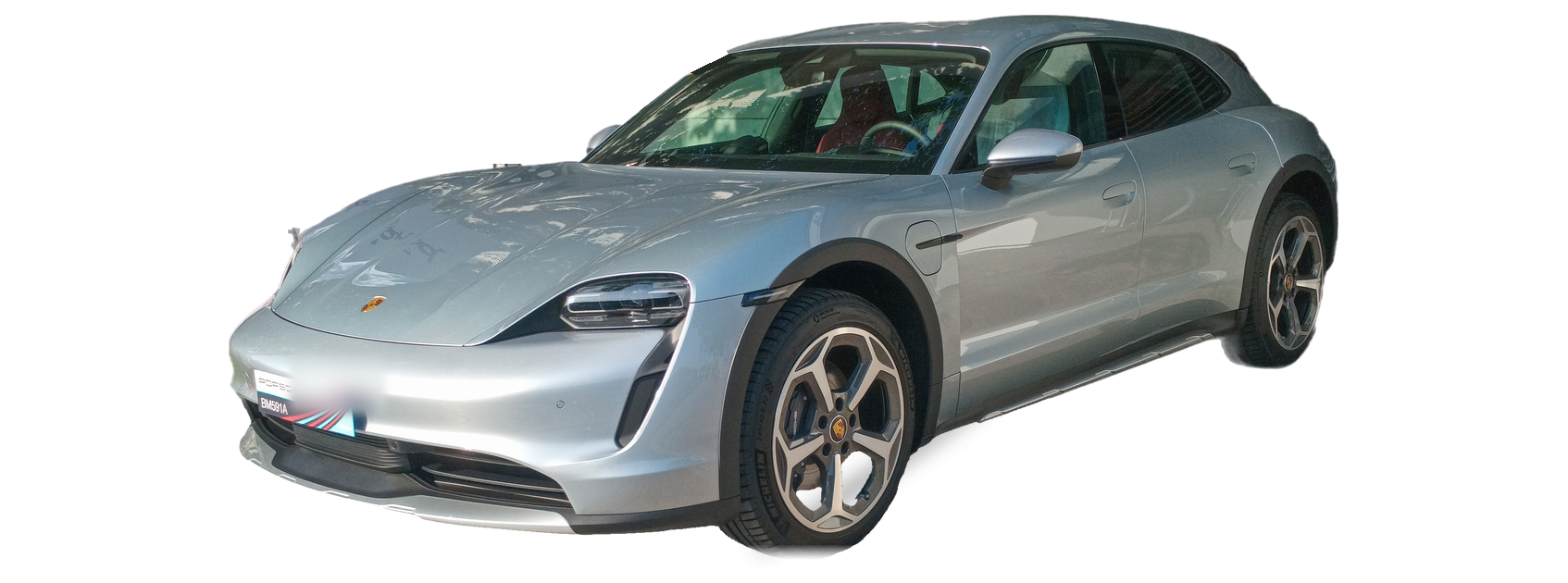 Porsche Taycan plateado (primera generación), familiar crossover, vista frontal de tres cuartos, con las ubicaciones del VIN marcadas