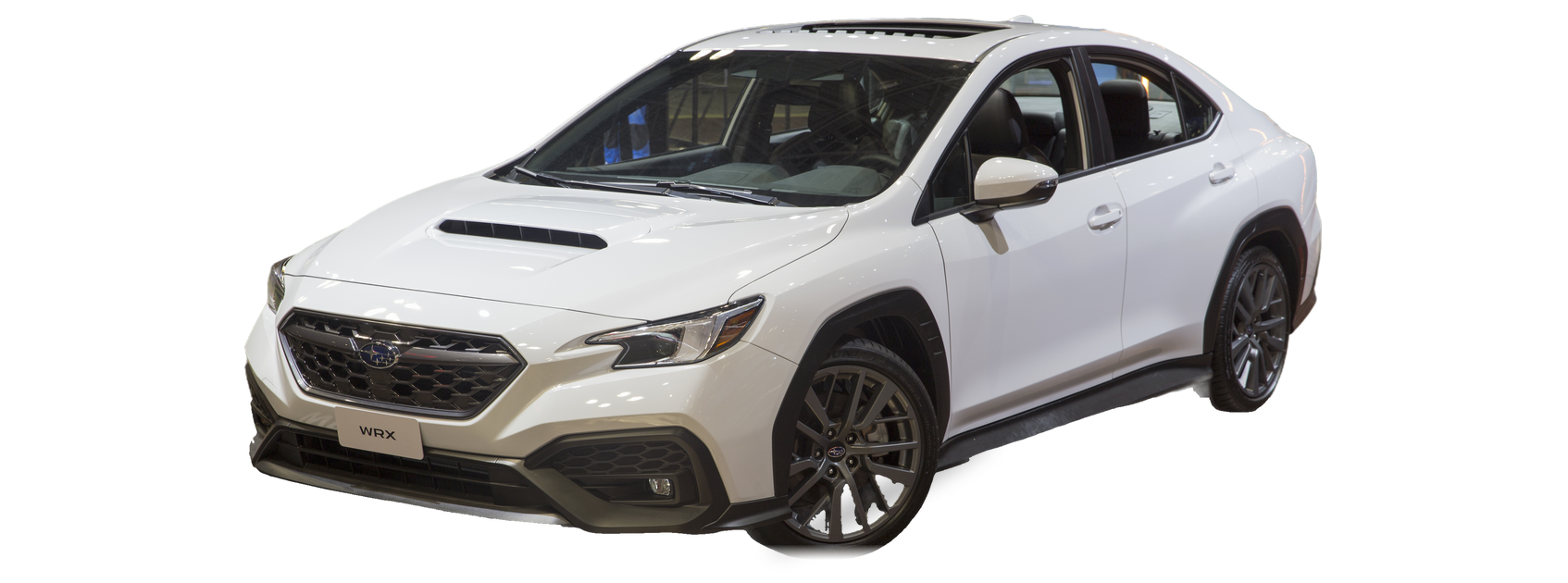 White Subaru WRX (fifth generation) sedan, front three-quarter view, with the VIN locations marked