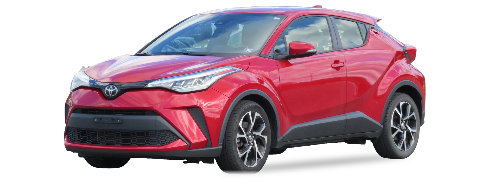 Red Toyota C-HR (first generation) SUV, front three-quarter view, with the VIN locations marked