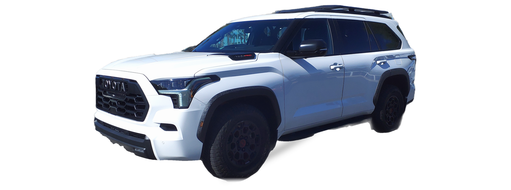 White Toyota Sequoia (third generation) SUV, front three-quarter view, with the VIN locations marked