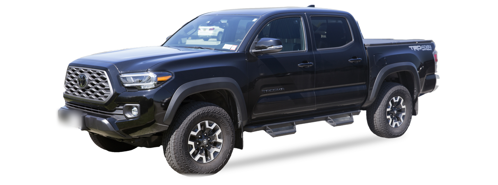 Black Toyota Tacoma (third generation) double cab pickup, front three-quarter view, with the VIN locations marked