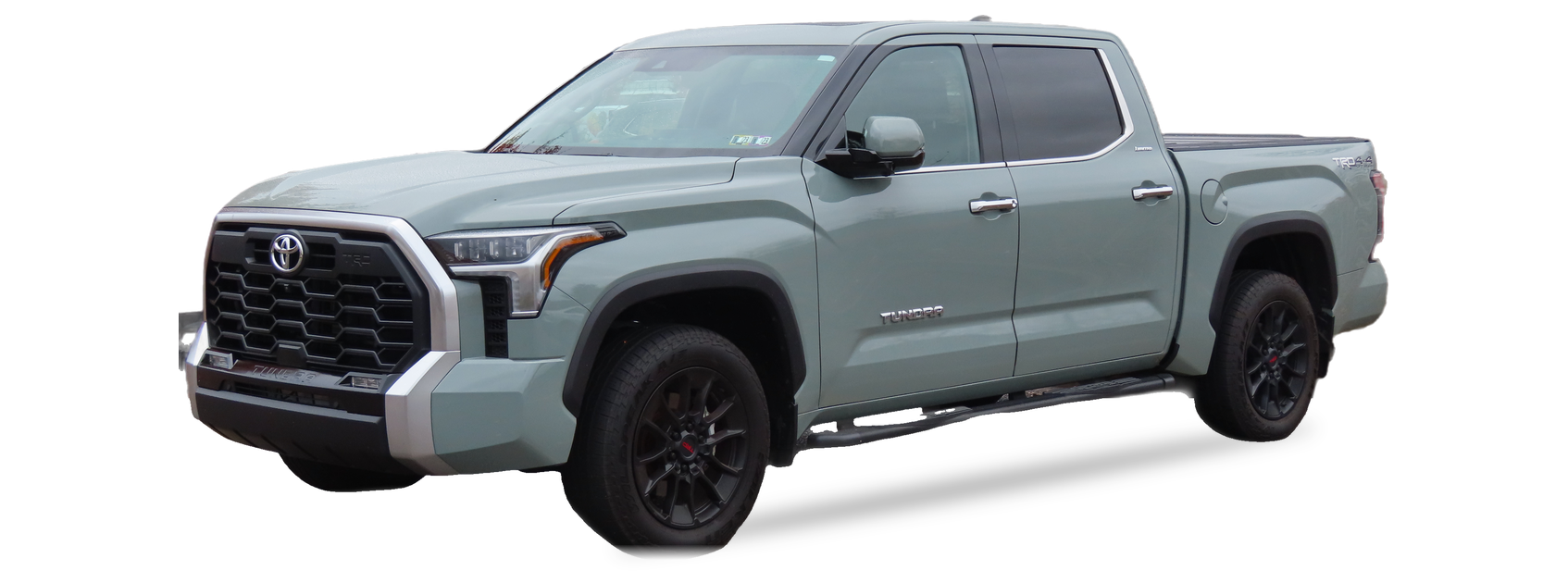 Gray Toyota Tundra (third generation) crew cab pickup, front three-quarter view, with the VIN locations marked