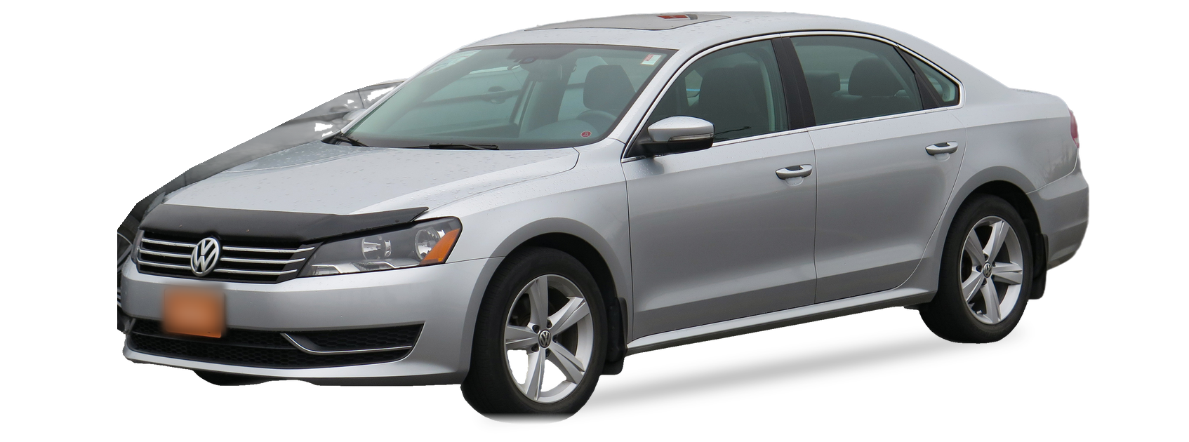 Silver Volkswagen Passat (NMS generation) sedan, front three-quarter view, with the VIN locations marked