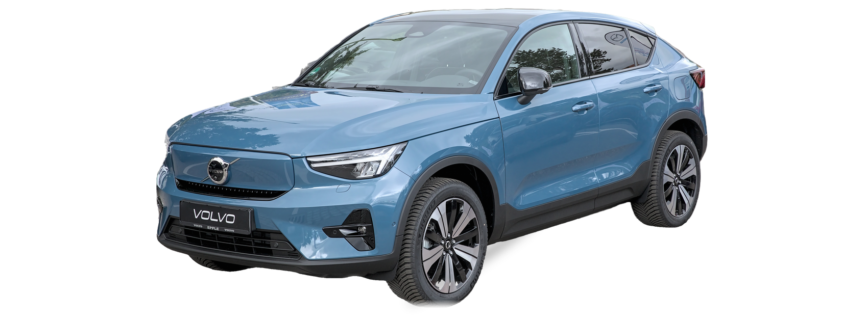 Blue Volvo C40 (first generation) SUV, front three-quarter view, with the VIN locations marked