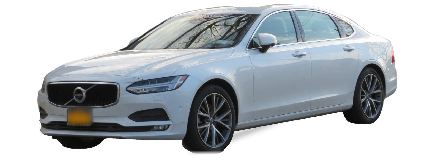Silver Volvo S90 (second generation) sedan, front three-quarter view, with the VIN locations marked