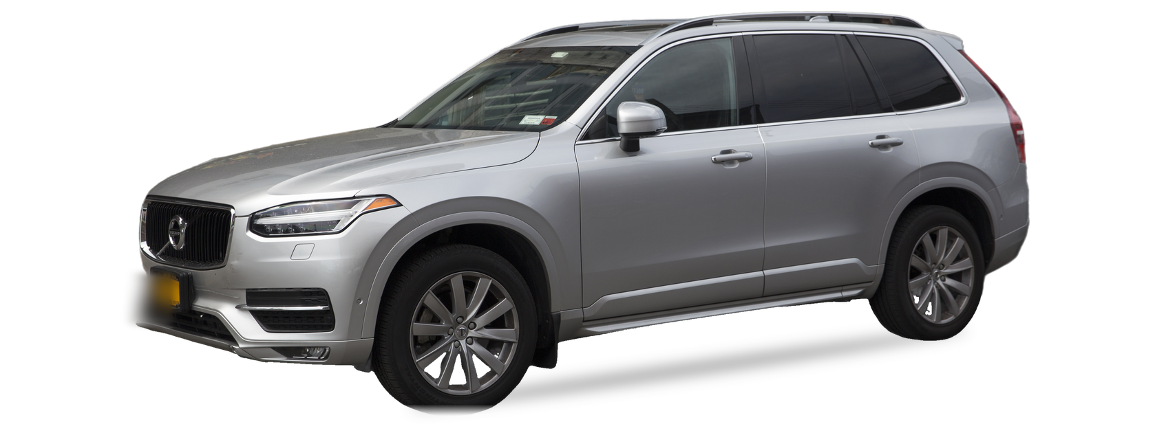 Silver Volvo XC90 (second generation) SUV, front three-quarter view, with the VIN locations marked